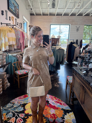 Woman wearing the Leone Suede Mini Dress from Ellipsis Boutique styled for fall