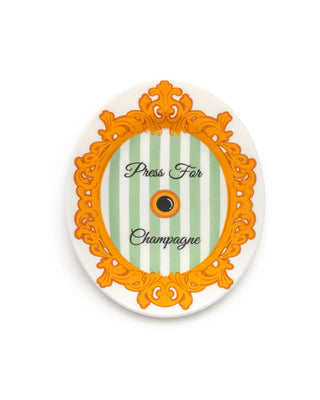 Decorative round object with orange frame and striped interior on a white background