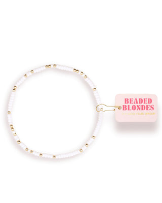 White beaded anklet with gold accents on a white background, featuring 'Beaded Blondes' branding.