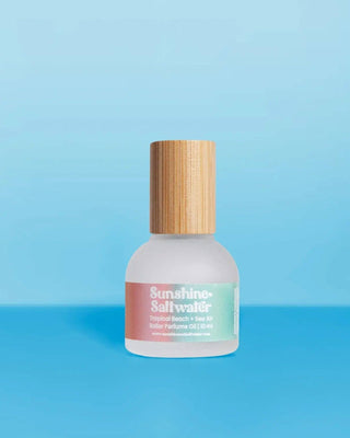 Skincare bottle with wooden cap on a blue background