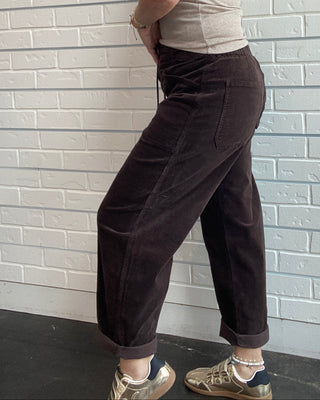 Daze Chocolate Corduroy Barrel Pants at Ellipsis Boutique. Soft drawstring pants with a relaxed barrel-leg fit 
