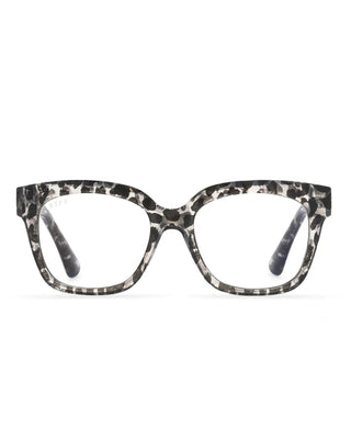 Cat-eye glasses with a black and white marbled frame on a white background