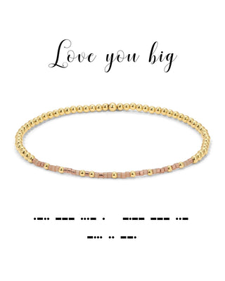 Gold beaded bracelet on a white background with 'Love you big' text.