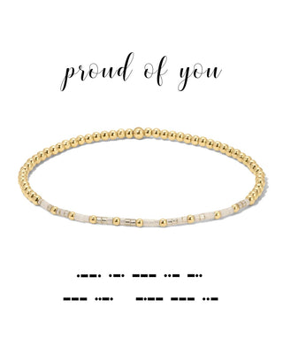 Gold beaded bracelet on a white background with 'proud of you' text.