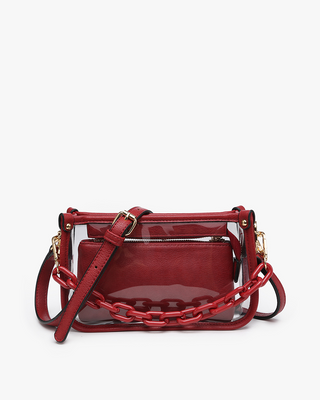 Red handbag with a clear section and chain detail on a white background