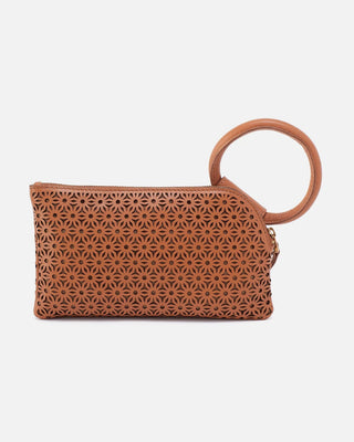 Brown woven pouch with a key ring on a light gray background
