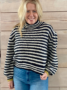 Black and white stripe sweater with mustard yellow cuffs