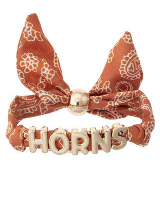 Orange bandana slider bracelet with floral pattern and 'Horns' text on a white background