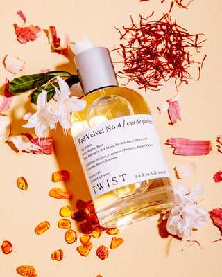 Perfume bottle labeled 'Red Velvet No. 4' with decorative elements on a beige background