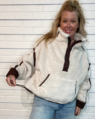 Vintage Havana beige sherpa quarter zip jacket with brown contrast binding, relaxed fit, and kangaroo pocket