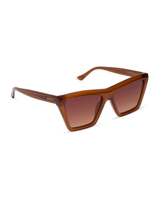 A pair of angular square sunglasses with translucent brown acetate frames and matching brown gradient lenses, shown on a clean white background.
