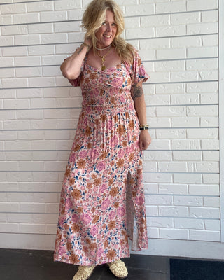 Women's multicolor floral midi skirt with a pintuck waist, side slit, flowy silhouette, and pull-on design with top