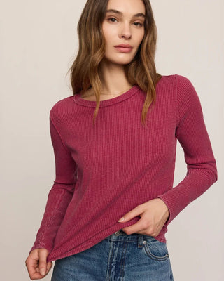  lightweight mineral-wash waffle knit top with a fitted silhouette and long sleeves.