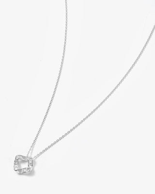 A silver chain necklace with a square pendant featuring a central cutout and clear stones around the border, displayed on a clean white background.