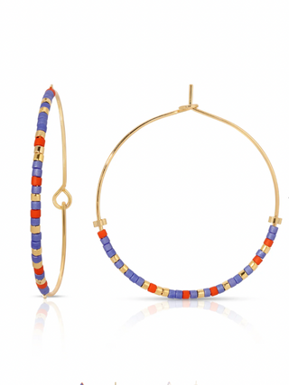 Gold hoop earrings with colorful bead accents that spell out 'best friend' in morse code on a white background