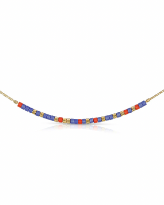 Necklace with colorful beads that spell out 'best friend' in morse code on a white background