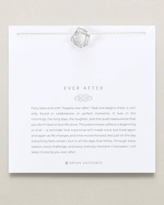 A white card with the title 'EVER AFTER' and a short poem, featuring a small silver-toned jewelry box illustration near the top and the brand name Bryan Anthons at the bottom, photographed against a light beige background.