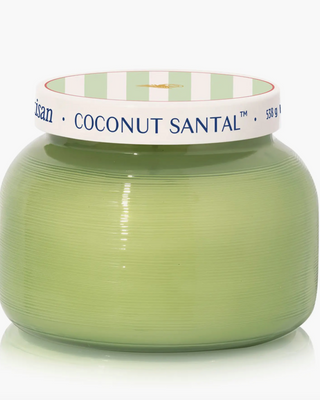 Green jar candle with a striped lid labeled 'Coconut Santal' on a white background