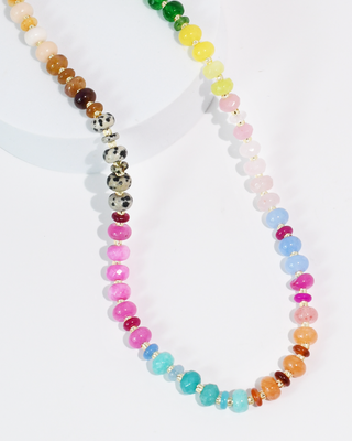 Colorful beaded necklace on a white background