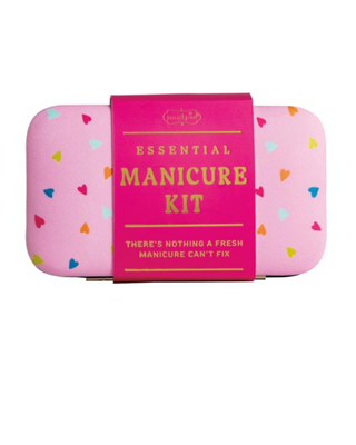 Pink manicure kit with colorful heart patterns on a white background