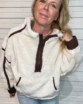 Vintage Havana beige sherpa quarter zip jacket with brown contrast binding, relaxed fit, and kangaroo pocket