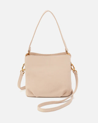 Beige handbag with a strap on a white background