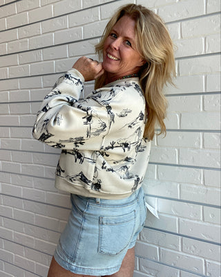 soft sponge fleece sweatshirt with a relaxed boxy fit and western-inspired graphic