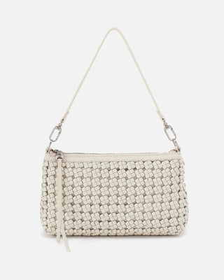 Woven handbag with a strap on a white background