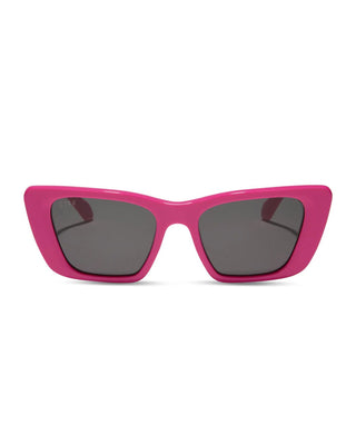 Pink sunglasses with dark lenses on a white background