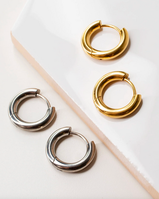 silver and gold small huggie earrings