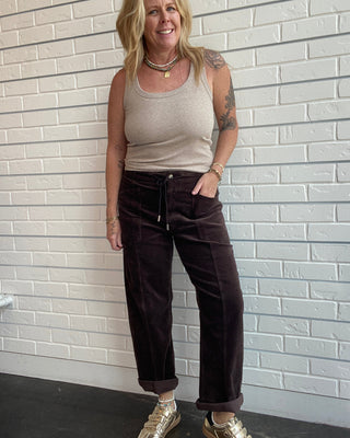 Daze Chocolate Corduroy Barrel Pants at Ellipsis Boutique. Soft drawstring pants with a relaxed barrel-leg fit 