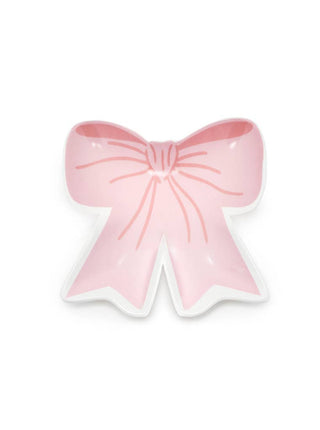 Pink bow-shaped object on a white background