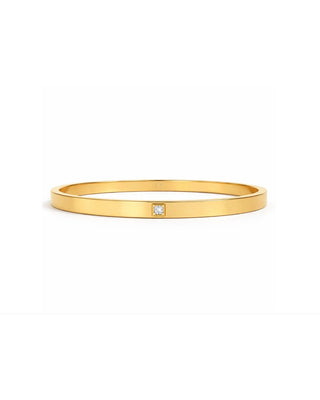 Ellie Vail Marjorie solitaire bangle bracelet featuring a cubic zirconia accent and water-resistant stainless steel.