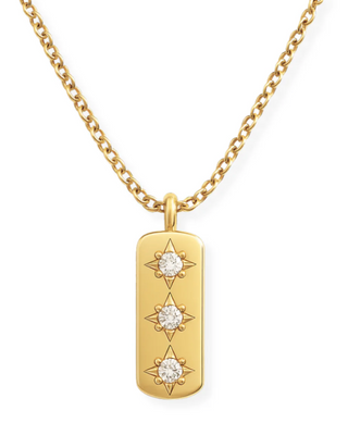 Gold necklace with a star-shaped pendant on a white background