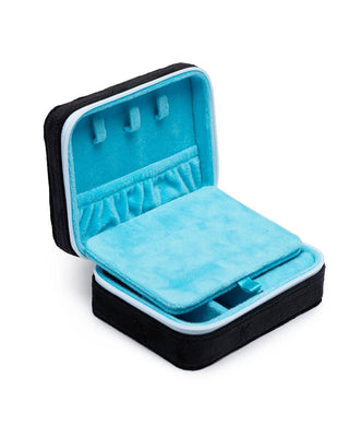 Jewelry box with blue interior and black exterior on a white background