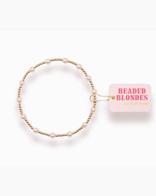 Beaded hair tie with 'Beaded Blondes' packaging on a white background