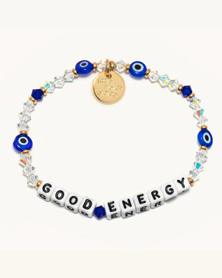 Bracelet with 'GOOD ENERGY' beads and blue evil eye charms on a white background