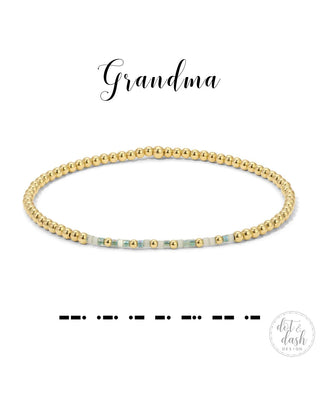 Gold beaded bracelet on a white background with 'Grandma' text and Dash & Dot Design logo.