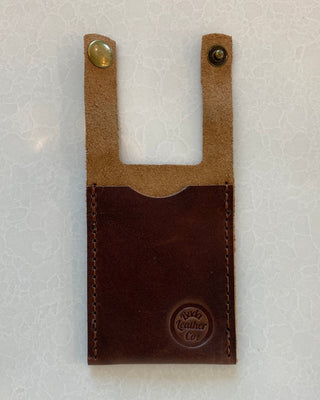 Brown leather boot wallet with a visible brand logo on a white background