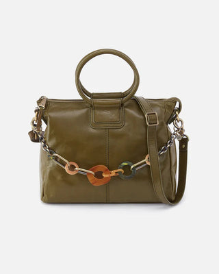 Green handbag with a chain detail on a white background