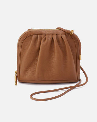 Brown leather crossbody bag on a light gray background