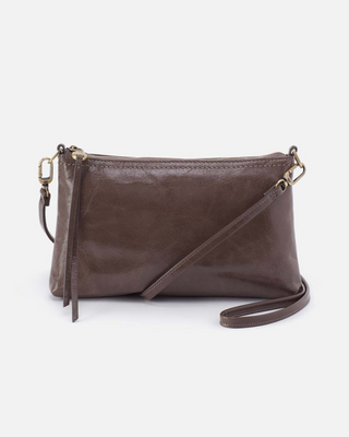 Brown leather crossbody bag on a white background