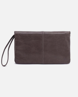Dark brown leather clutch bag on a light gray background