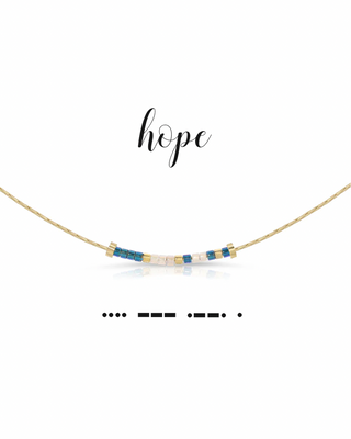Necklace with blue and gold beads on a white background with 'hope' text in morse code.