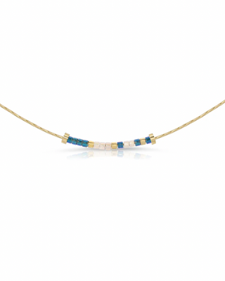 Necklace with blue and gold beads that spells out 'hope' in morse code on a white background
