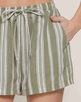 Green and white striped shorts with a tie waist on a neutral background