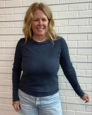 Z Supply Arlet Mini Thermal Top in Oxford Blue. A lightweight mineral-wash waffle knit top with a fitted silhouette and long sleeves.