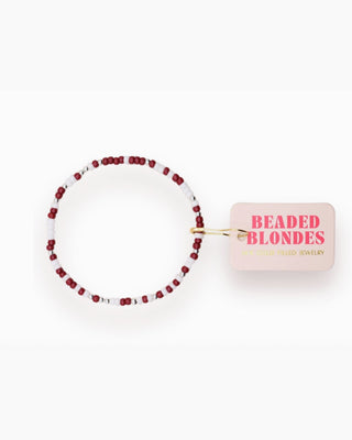 Beaded bracelet with a pink tag labeled 'Beaded Blondes' on a white background
