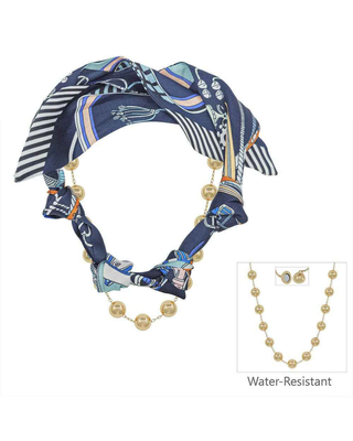 A blue patterned scarf styled as a headband with gold-tone bead accents, shown on a white background with a small inset of matching gold-tone earrings and the text 'Water-Resistant'.