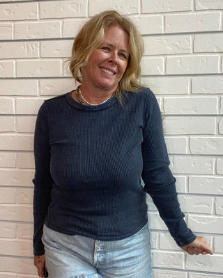 Z Supply Arlet Mini Thermal Top in Oxford Blue. A lightweight mineral-wash waffle knit top with a fitted silhouette and long sleeves.
